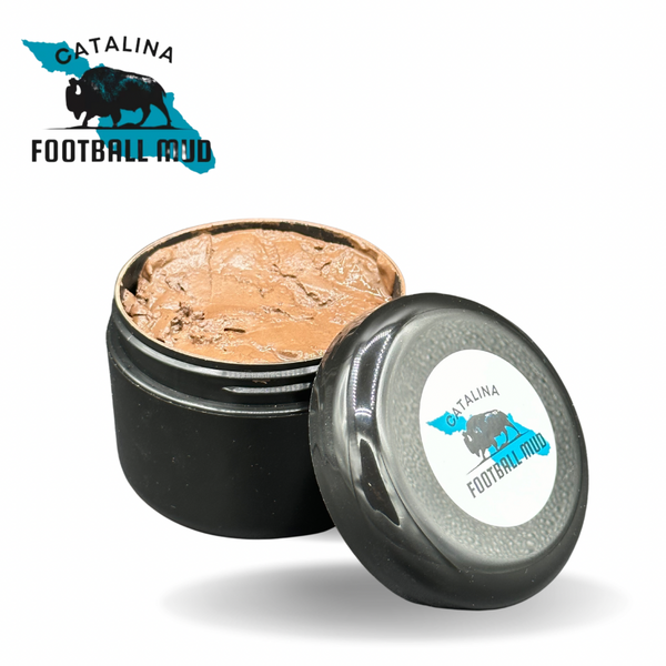 Open jar of Catalina Football Mud with visible brand logo on a white background